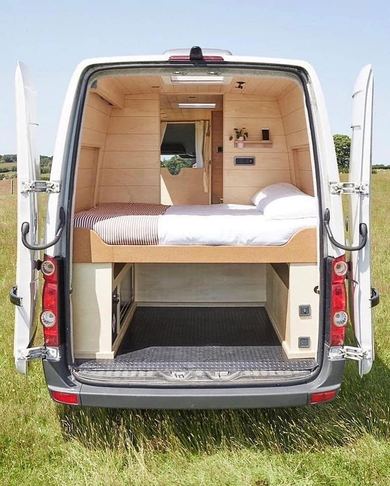 A Stylish Caravan Home with Wood and Green-themed Interior